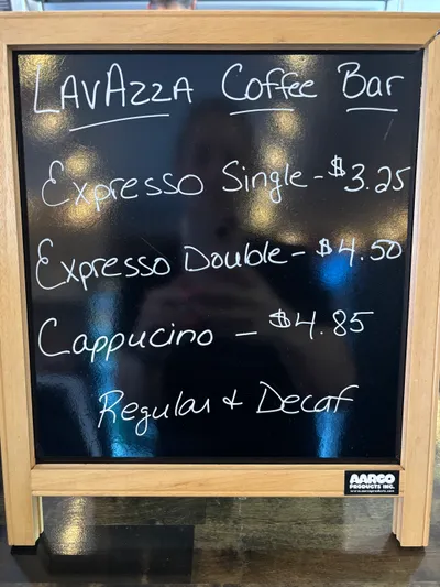 Lavazza coffee bar sign at the counter